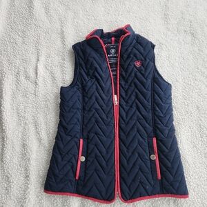 Ariat Ashley Kids Vest in the "Navy Eclipse" color with pink trim. It is a quilt